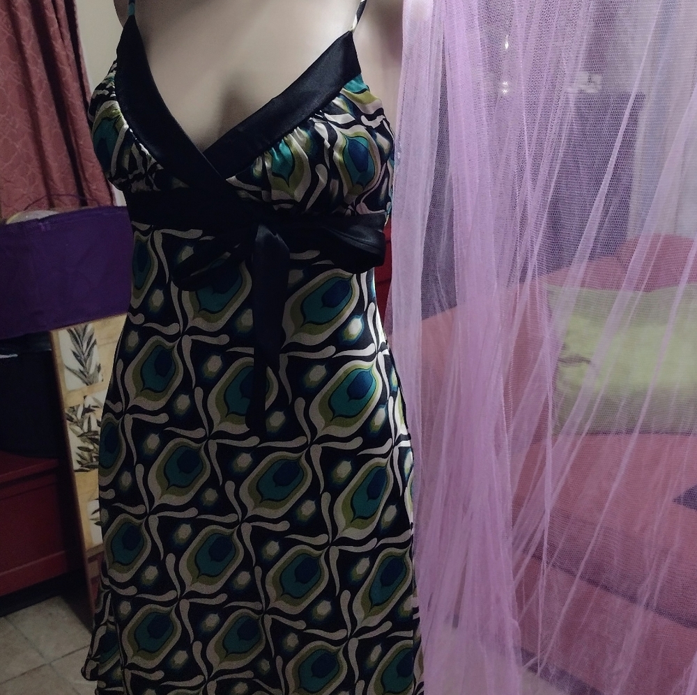 Cute slinky dress. Satin material.